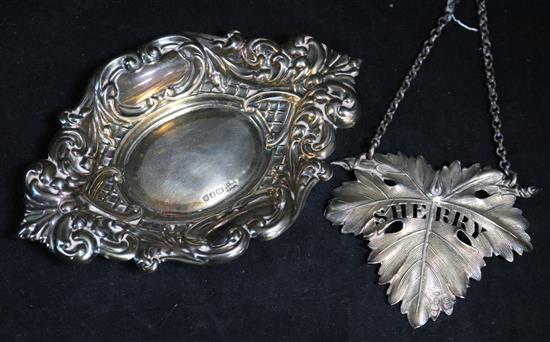 A George IV silver wine label Sherry, London 1826 by William Ker Reid and a modern silver Victorian style bon bon dish.